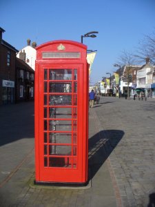 A traditional red telephone box in Fareham West Street