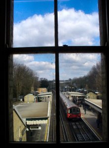 Through a station window at Totteridge and Whetstone Tube Station, looking north towards High Barnet