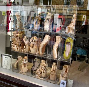 Ballet pumps, in a shop window of one of the many shops selling dance-wear in the Covent Garden area...